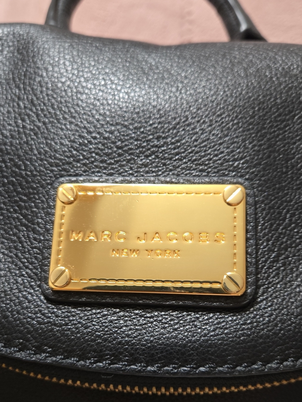 Marc Jacobs Black Leather Backpack with Gold Plaque